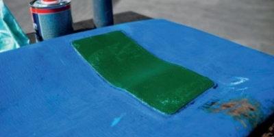 Een patch geplakt op een kuilafdekslang